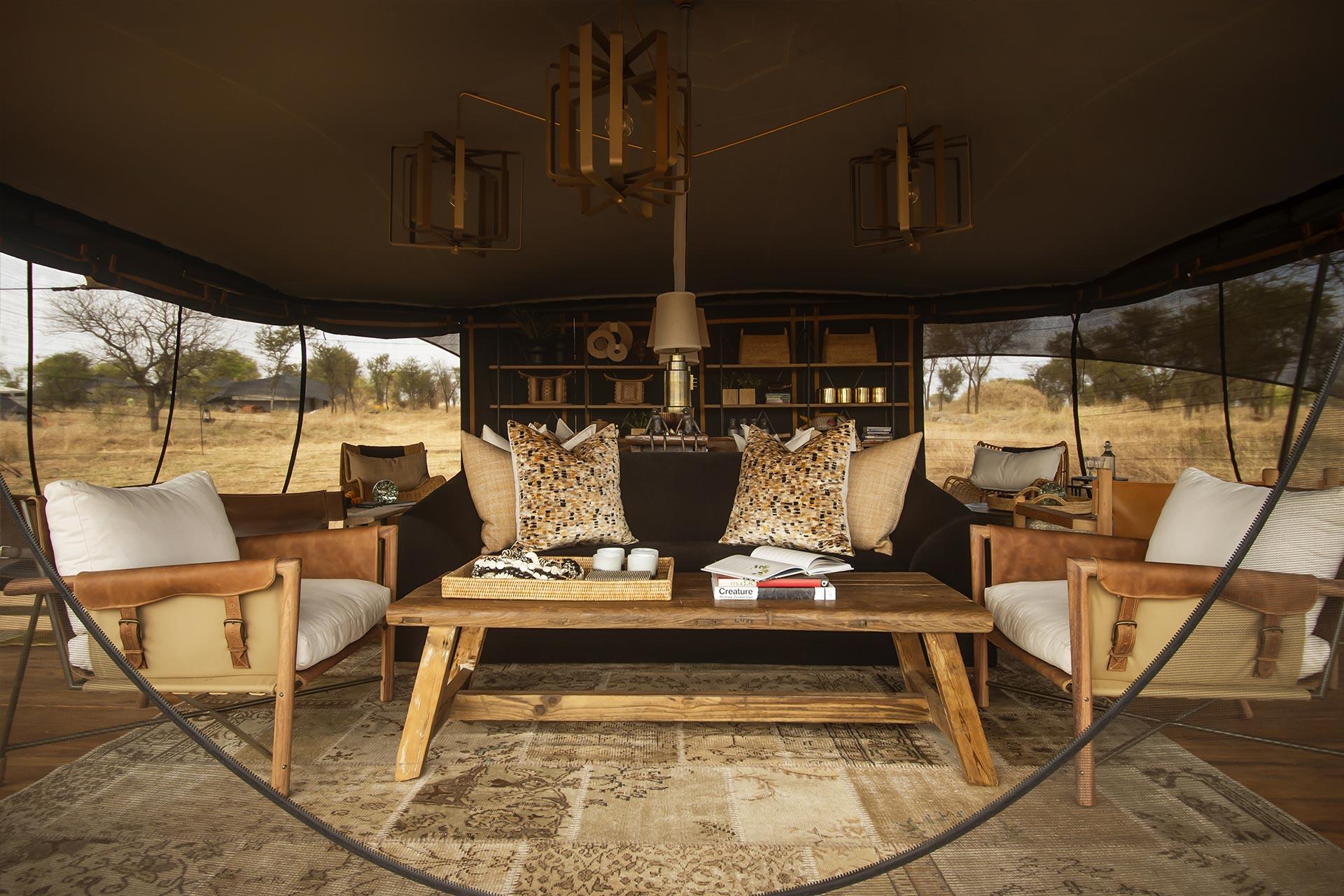 The Siringit Migration Camp has been made in Tanzania using locally sourced and recycled materials. The stretched canvas panels have been cut, handstitched and custom-designed to bring you closer to nature